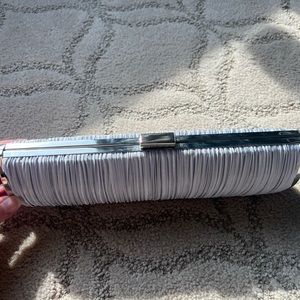 Silver evening/special occasion clutch with should strap